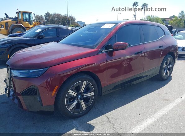 WB523CF05SCT40718 2025 BMW IX Бордовый Передняя левая четверть