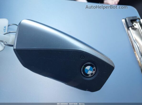 WB523CF05SCT40718 2025 BMW IX Бордовый Вид панели приборов
