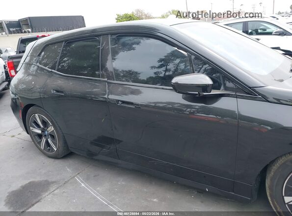 WB523CF06PCM54850 2023 BMW IX Black Widok wnętrza 360 stopni