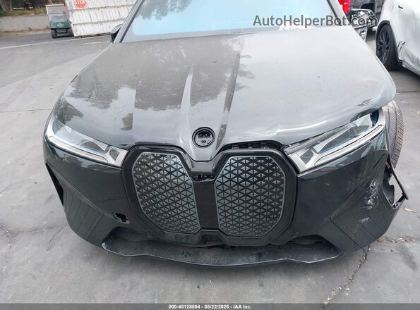 WB523CF06PCM54850 2023 BMW IX Black Widok wnętrza z tyłu