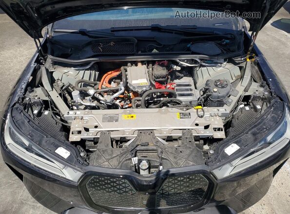WB523CF08SCS11226 2025 BMW IX Charcoal Вид задньої частини салону