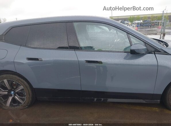 WB533CF05PCM54813 2023 BMW IX Blue Widok wnętrza z tyłu