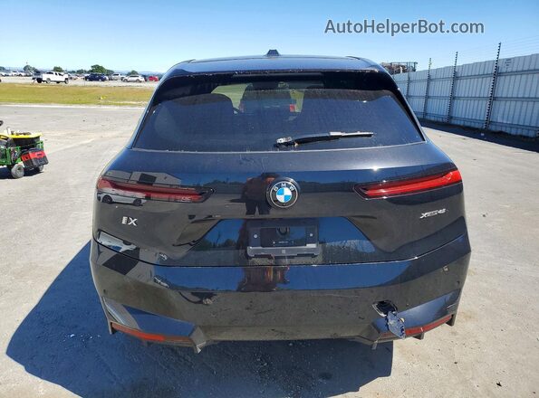 WB543CF06TCV37620 2026 BMW IX Black Вид ззаду