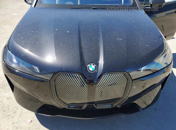WB543CF06TCV37620 2026 BMW IX Black Вид підкапотного простору