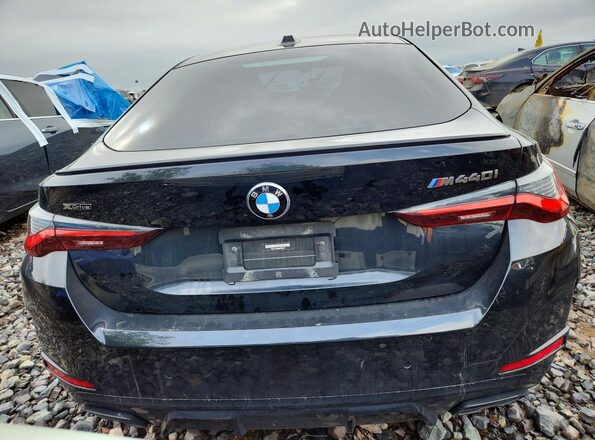 WBA13AW08RFR08311 2024 BMW M4 Black Вид ззаду