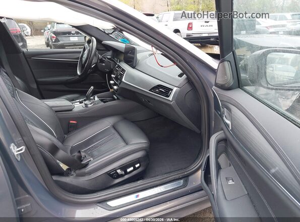 WBA13BK05PCM25563 2023 BMW M5 Gray Vista interior delantera