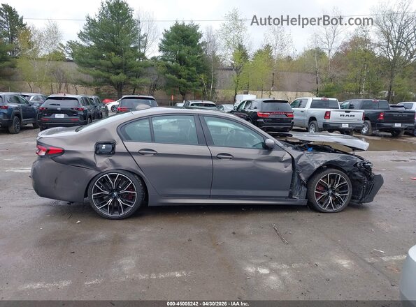 WBA13BK05PCM25563 2023 BMW M5 Gray Vista interior trasera