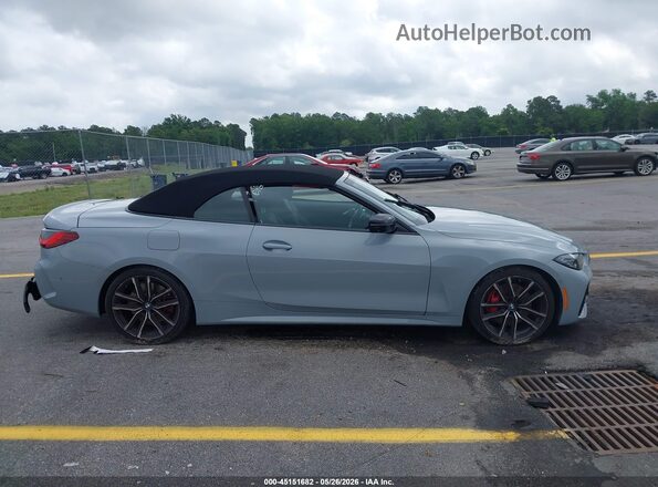 WBA23AT04RCP10612 2024 BMW 4 SERIES Gray Vista interior trasera