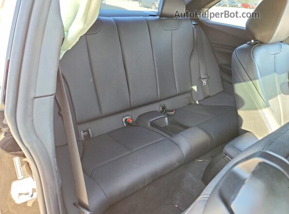 WBA2J1C52JVD09251 2018 BMW 2 SERIES Black Widok tylnych siedzeń