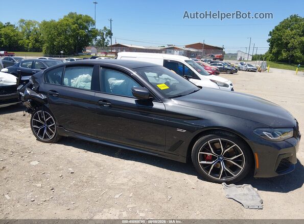 WBA33AG06PCL90639 2023 BMW 5 SERIES Black Widok wnętrza z tyłu