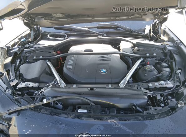 WBA33EH00RCT01866 2024 BMW 7 SERIES Black Rear view