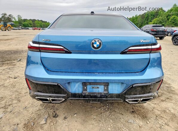 WBA33EJ07RCR42720 2024 BMW 7 SERIES Синий Вид сзади