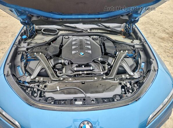 WBA33EJ07RCR42720 2024 BMW 7 SERIES Синий Вид задней части салона