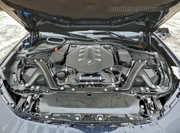 WBA33EJ0XRCT01867 2024 BMW 7 SERIES Black უკანა სალონის ხედი