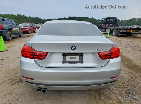 WBA3N7C52GK227670 2016 BMW 4 SERIES Silver Vista trasera