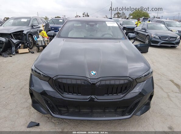 WBA43FJ00RCR13862 2024 BMW 7 SERIES Gray Widok wnętrza z tyłu