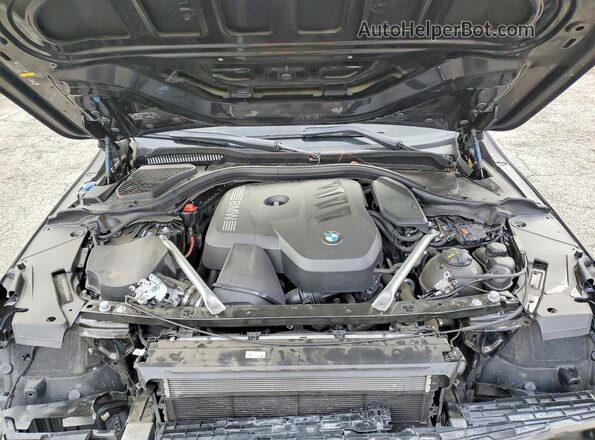 WBA43FJ05RCS86883 2024 BMW 5 SERIES Черный Вид задней части салона