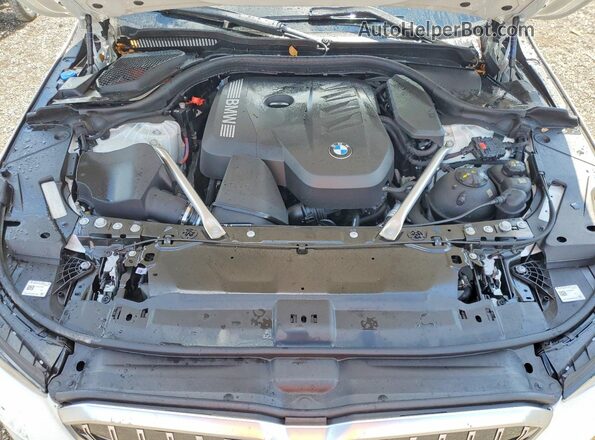 WBA43FJ06TCW26775 2026 BMW 5 SERIES White Vista interior trasera