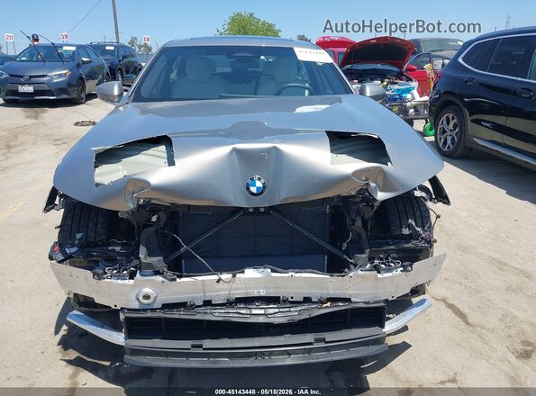 WBA43FJ07RCR24518 2024 BMW 5 SERIES Silver უკანა სალონის ხედი
