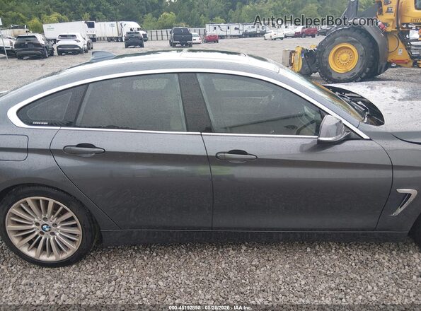 WBA4B1C5XGG241863 2016 BMW 4 SERIES Gray Widok wnętrza z tyłu