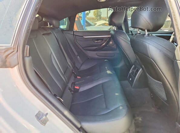 WBA4F7C37HG789066 2017 BMW 4 SERIES White Vista de los asientos traseros