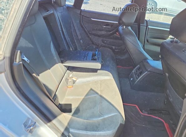 WBA4F7C57HG787240 2017 BMW 4 SERIES Silver Вид задніх сидінь
