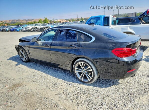WBA4J1C50KBM19157 2019 BMW 4 SERIES Black Tył lewy