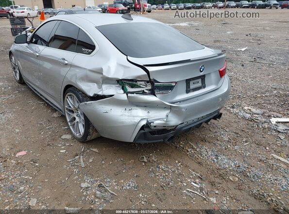 WBA4J1C59KBU67384 2019 BMW 4 SERIES Silver Front view