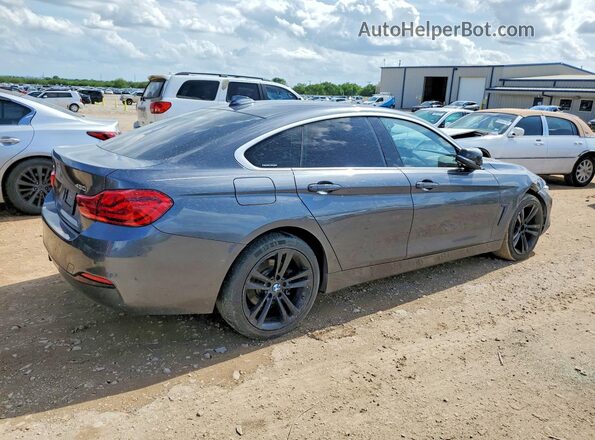 WBA4J3C51KBL11299 2019 BMW 7 SERIES Gray 