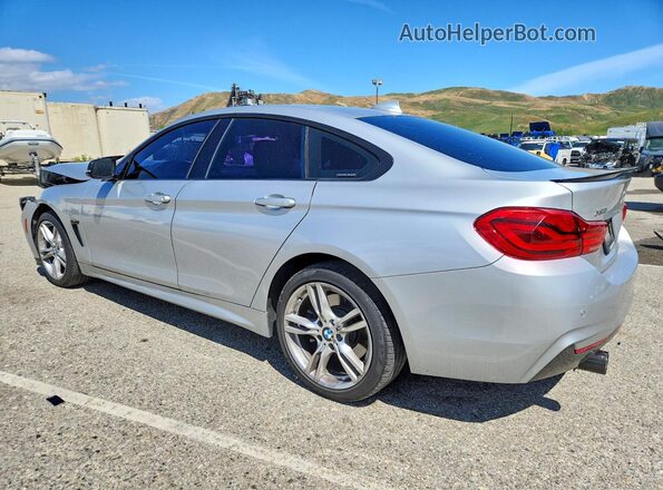 WBA4J3C54JBG96908 2018 BMW 7 SERIES Silver 