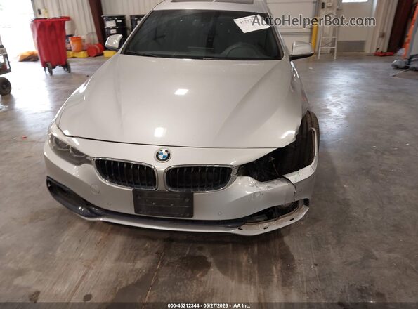 WBA4J3C59JBL04504 2018 BMW 4 SERIES Silver Front view