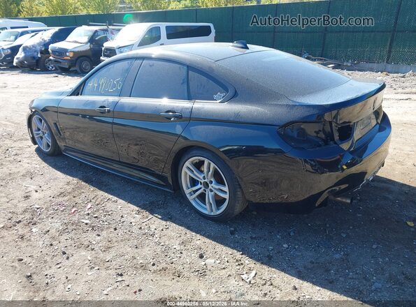 WBA4J7C50JBB98549 2018 BMW 7 SERIES Black Rear left