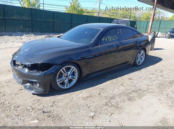 WBA4J7C50JBB98549 2018 BMW 7 SERIES Black Front left