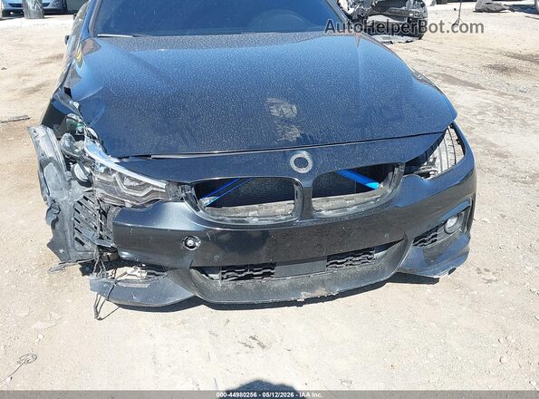 WBA4J7C50JBB98549 2018 BMW 7 SERIES Black Front view