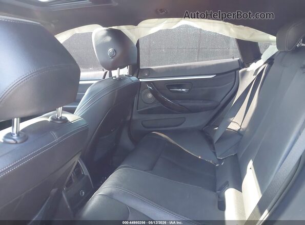 WBA4J7C50JBB98549 2018 BMW 7 SERIES Black VIN sticker view