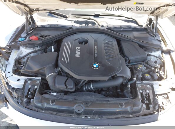 WBA4P1C52HK522216 2017 BMW 7 SERIES Gray Vista trasera
