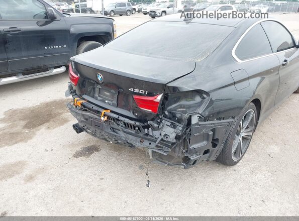 WBA4W3C50KAF91999 2019 BMW 4 SERIES Black Front view
