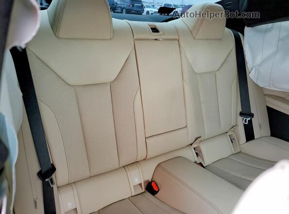 WBA53AP05RCP10691 2024 BMW 4 SERIES Blue Vista de los asientos traseros
