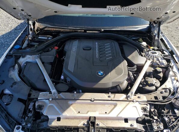 WBA53AT01NCJ15062 2022 BMW M4 White Vista interior trasera