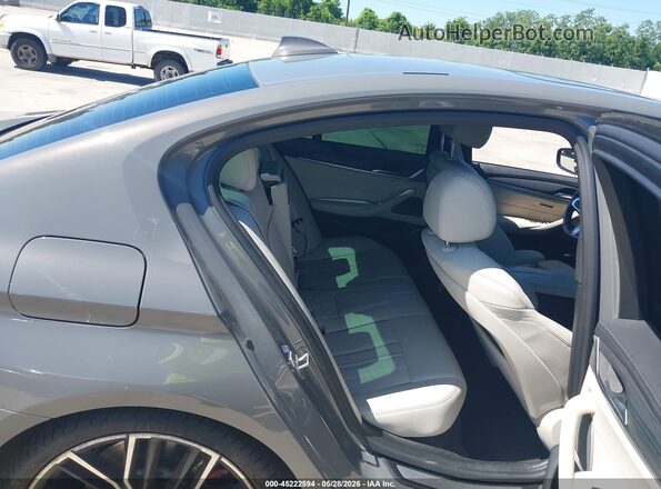 WBA53BH00MCF08129 2021 BMW 5 SERIES Gray VIN კოდის სტიკერის ხედი