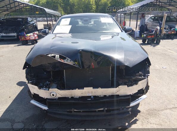 WBA53FJ06RCS33758 2024 BMW 5 SERIES Black უკანა სალონის ხედი