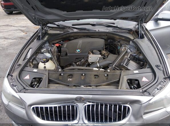WBA5A7C59GG148262 2016 BMW 5 SERIES Gray Rear view