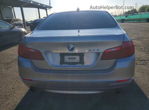 WBA5B3C55GG258182 2016 BMW 5 SERIES Gold Vista trasera