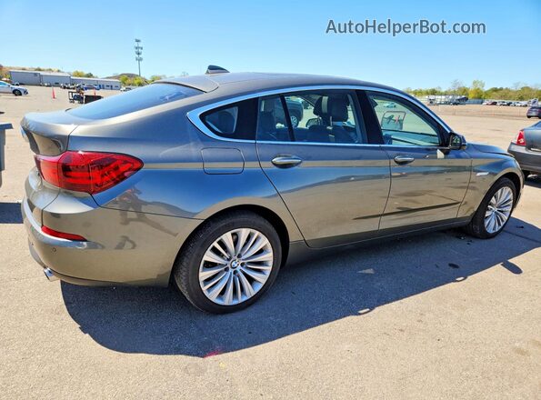 WBA5M4C57GD186581 2016 BMW 5 SERIES Gray Rear right