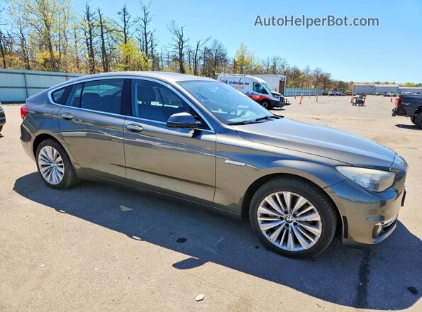 WBA5M4C57GD186581 2016 BMW 5 SERIES Gray Front right
