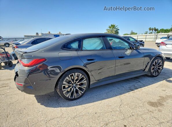 WBA63AV07PFP02899 2023 BMW 4 SERIES Gray Trasero derecho