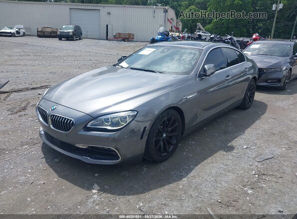 WBA6D0C32HG639937 2017 BMW 7 SERIES Gray Առջևի ձախ երեք քառորդ տեսարան