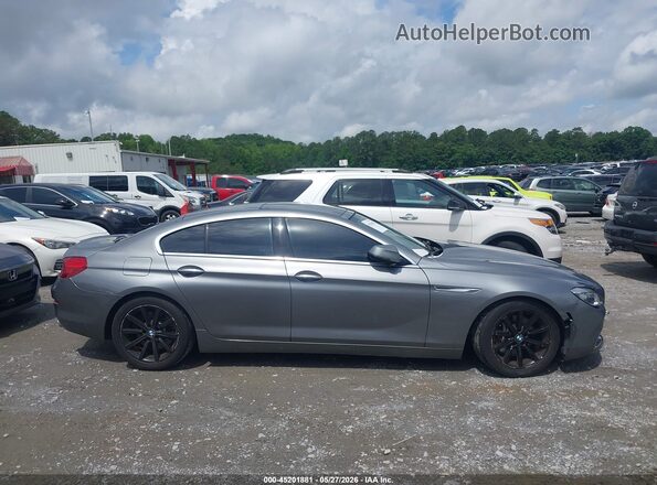 WBA6D0C32HG639937 2017 BMW 7 SERIES Gray Սալոնի հետևի տեսք