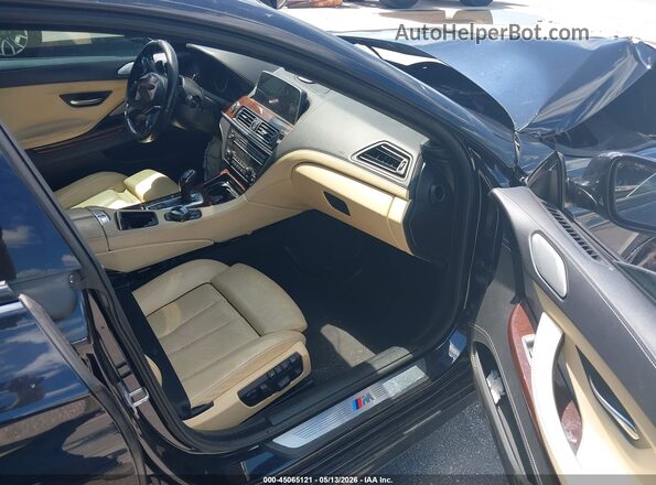 WBA6D6C57GGF94855 2016 BMW 6 SERIES Dark Blue Вид салона спереди