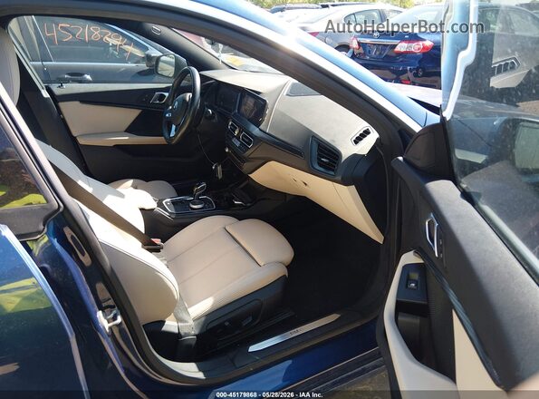 WBA73AK01P7N03141 2023 BMW 2 SERIES Blue Vista interior delantera